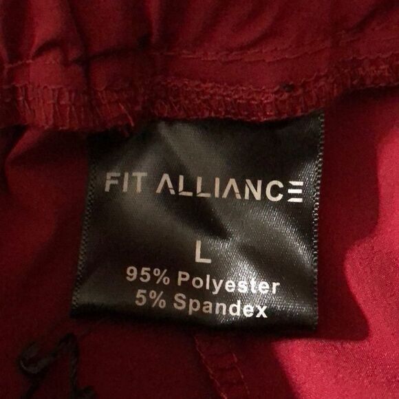 Fit Alliance L side pockets elastic tie waistband zippered legs for movement NWT - Picture 3 of 3